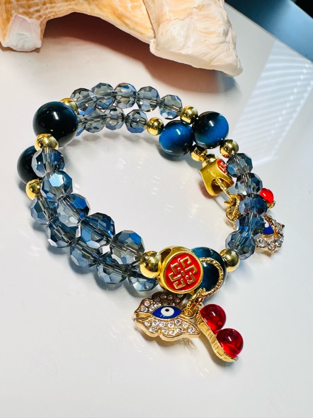 Gold and Blue Beaded Bracelet with Evil Eye Butterfly Charm